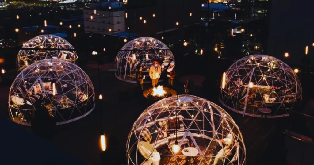 Cozy Up at a Rooftop Bar cute date idea 2024